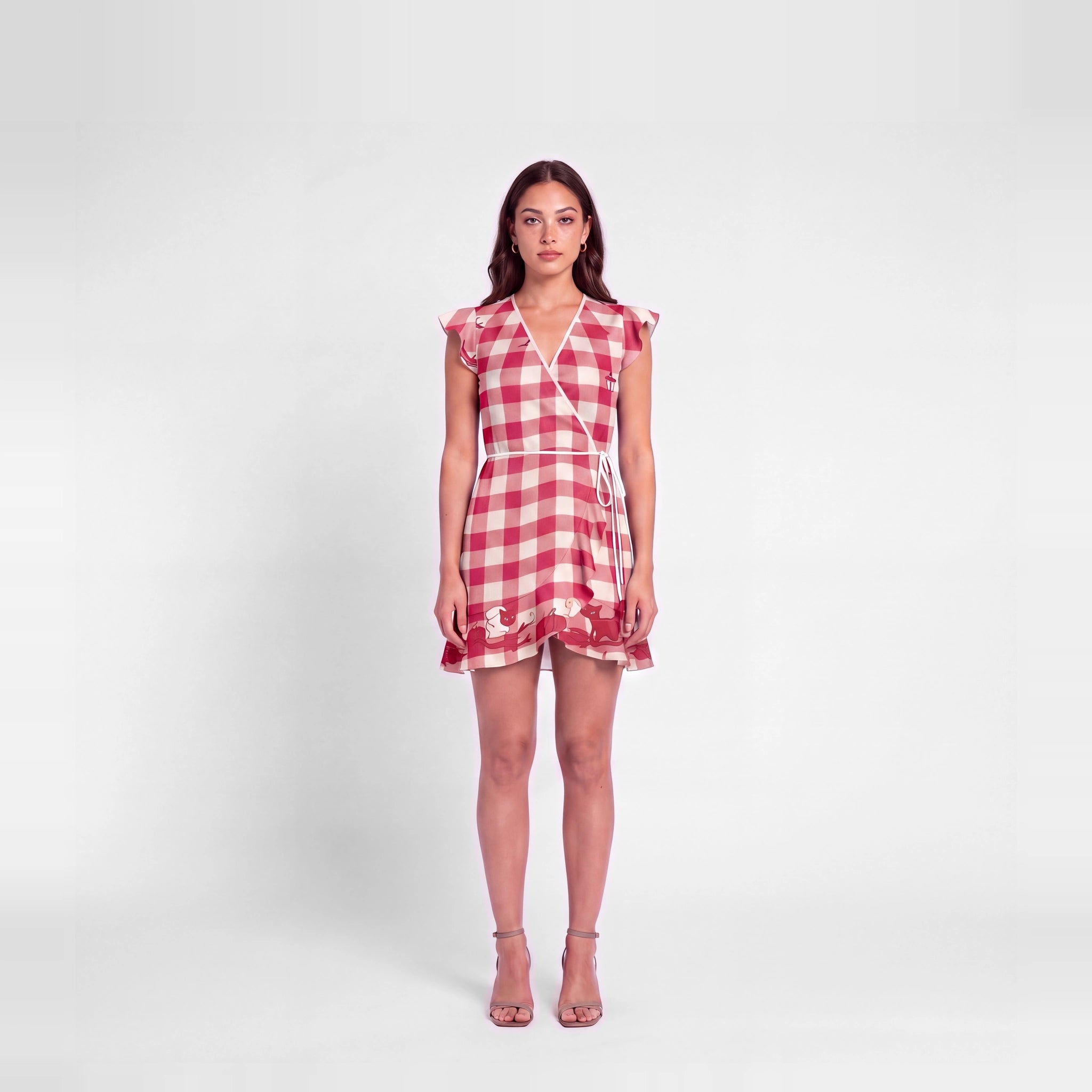 Promenade Rouge silk-body wrap tea dress in red and ivory gingham with illustrated hem motifs, front view