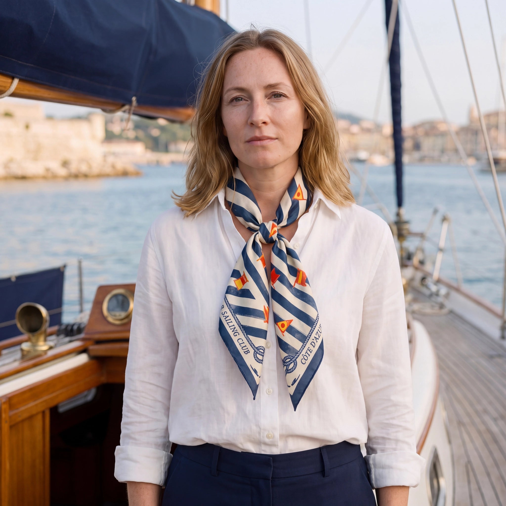 Carre Sailcloth Riviera silk scarf, front neck-tie view, navy and ivory stripes with nautical signal flags and rope details